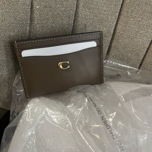 Coach card case in dark stone